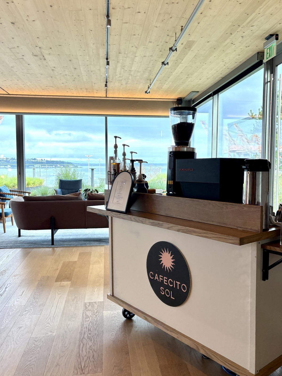 Cafecito Sol mobile coffee cart serving guests at an outdoor Seattle event